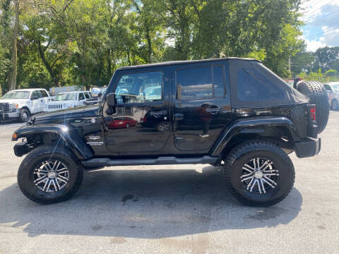 2011 Jeep Wrangler Unlimited for sale at CHAD AUTO SALES in Saint Louis MO